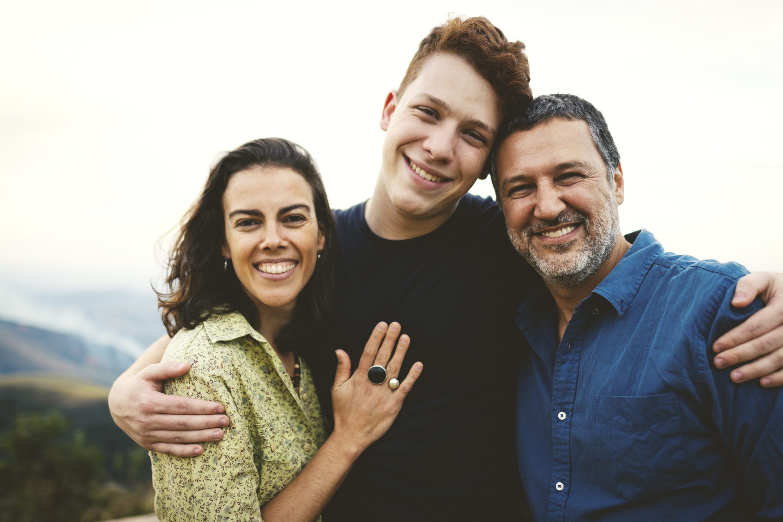 family poses for picture in Oklahoma after using Parental Choice Tax Credit for online school at Holston Academy